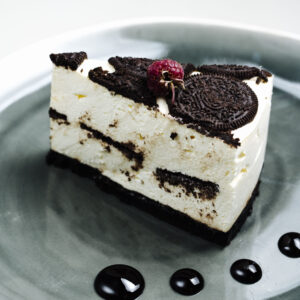 cheesecake topped with berry chocolate cookie scaled 1